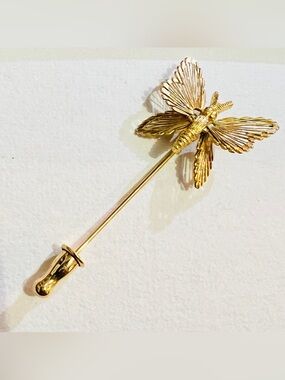 Vtg Monet gold-tone butterfly stick pin featuring delicate filigree wings